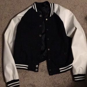 Black and white letterman’s jacket